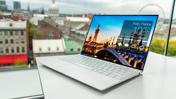 refurbished laptop on white table